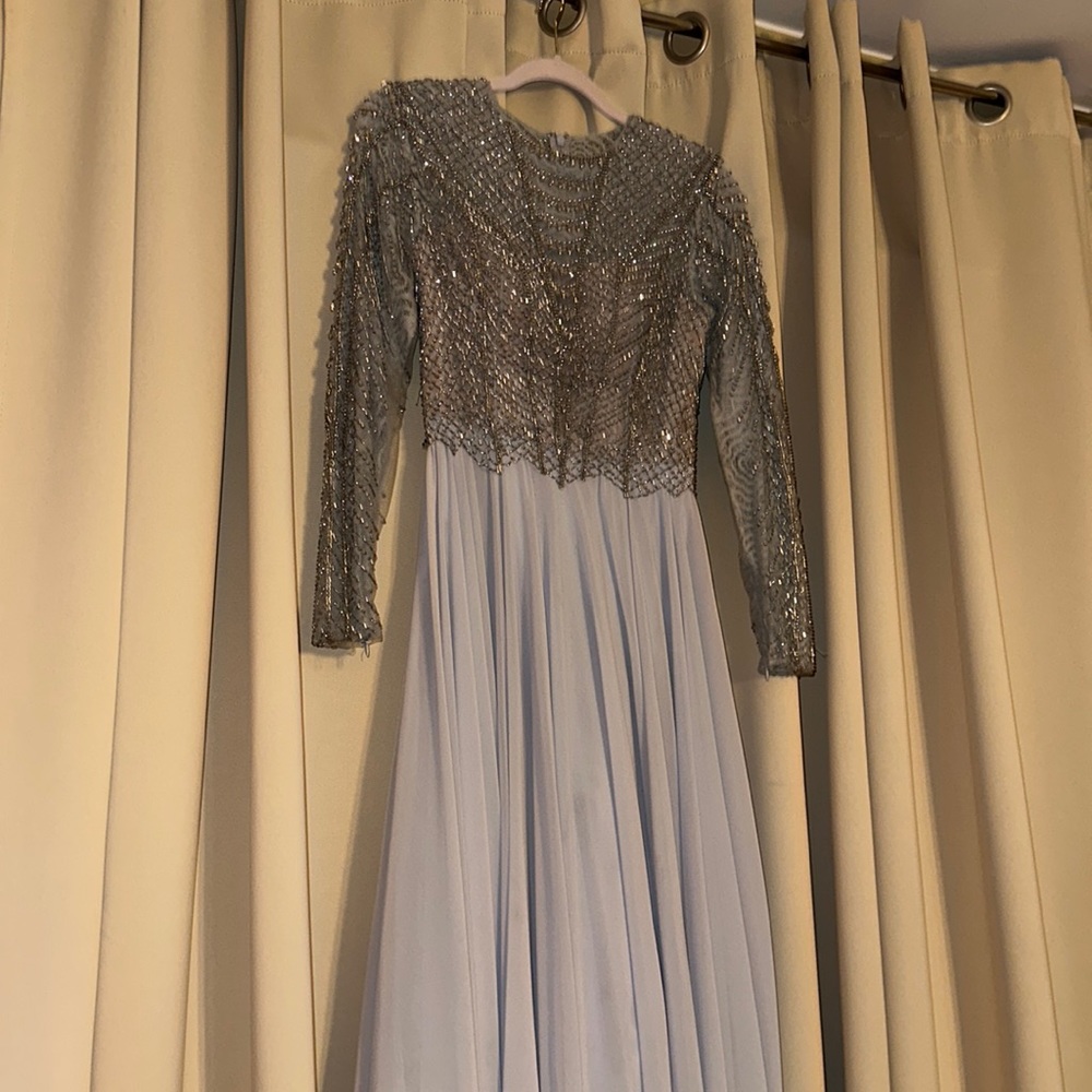 Beautiful Terrani couture dress! Beaded top long sleeve train.